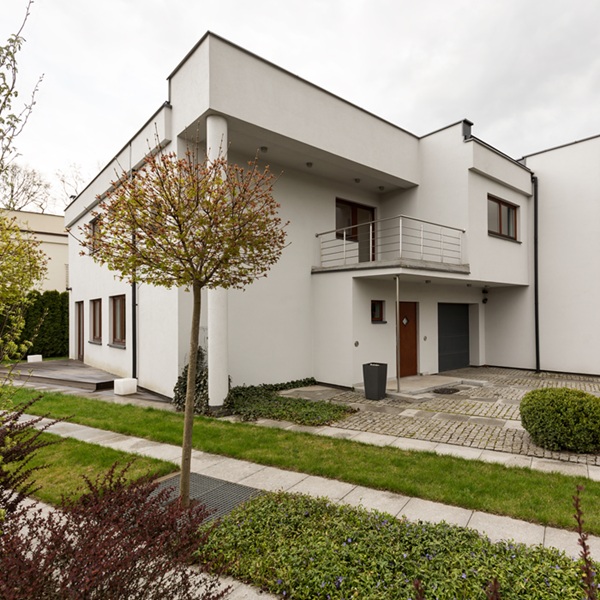 Contemporary home with a garden and balcony